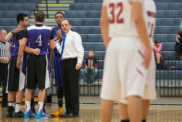 Rex Stanczak Pioneer's coach and starters look over at Pinckney's team before the start of Chelsea's holiday basketball tournament on Thursday Dec. 27th.
Courtney Sacco I AnnArbor.com 